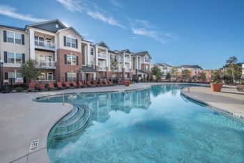 Resort style pool with sun deck